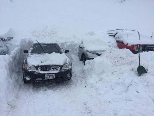 Car Next to Pile of Snow